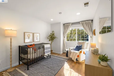 a bed room with furniture and a window