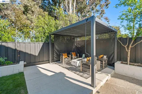 a patio view with a seating space
