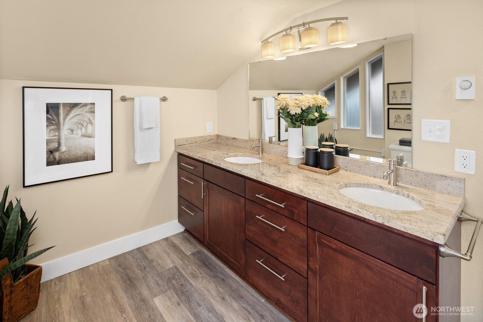 4522 3rd Avenue Northwest Seattle, WA 98107 - Photo 11 of 30 a spacious bathroom with a granite countertop sink and a mirror