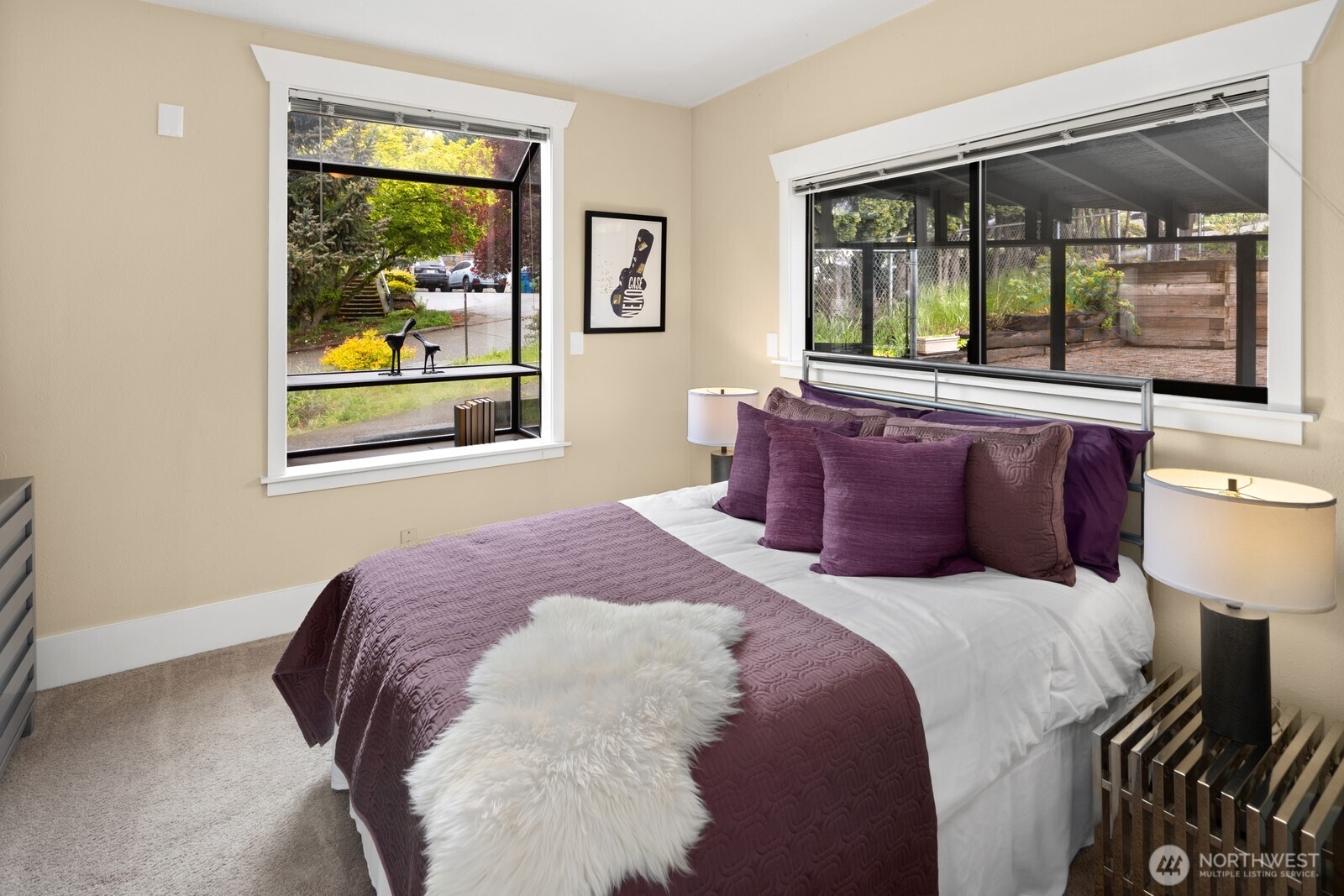 4522 3rd Avenue Northwest Seattle, WA 98107 - Photo 16 of 30 a bedroom with a bed and a painting on the wall