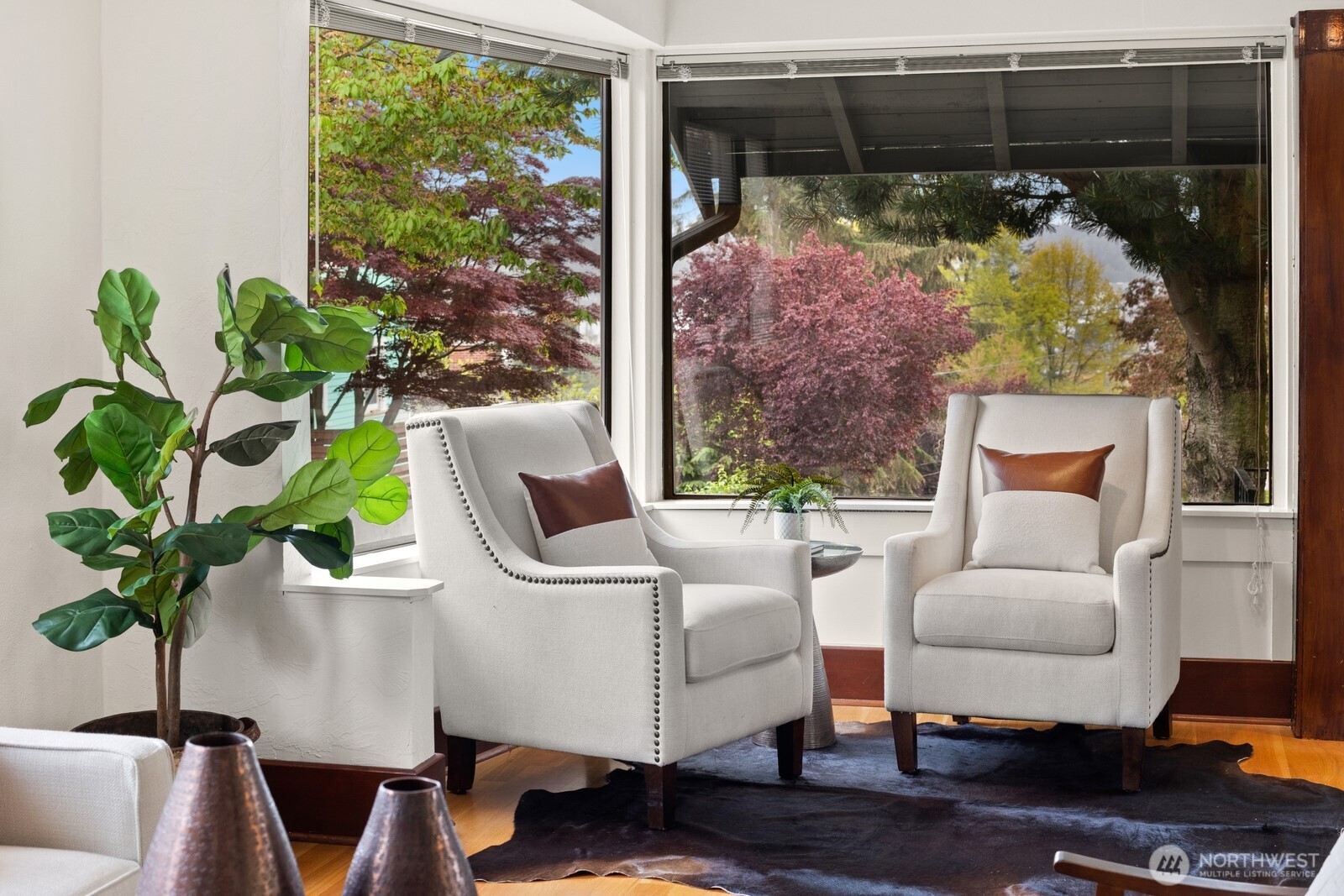 4522 3rd Avenue Northwest Seattle, WA 98107 - Photo 2 of 30 a living room with furniture and a potted plant