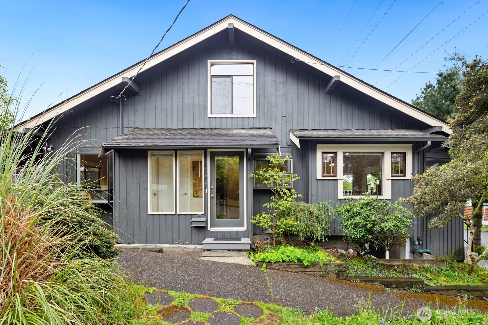 4522 3rd Avenue Northwest Seattle, WA 98107 - Photo 29 of 30 a front view of a house with garden