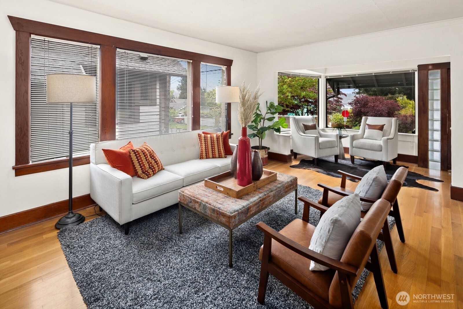 4522 3rd Avenue Northwest Seattle, WA 98107 - Photo 3 of 30 a living room with furniture and a large window