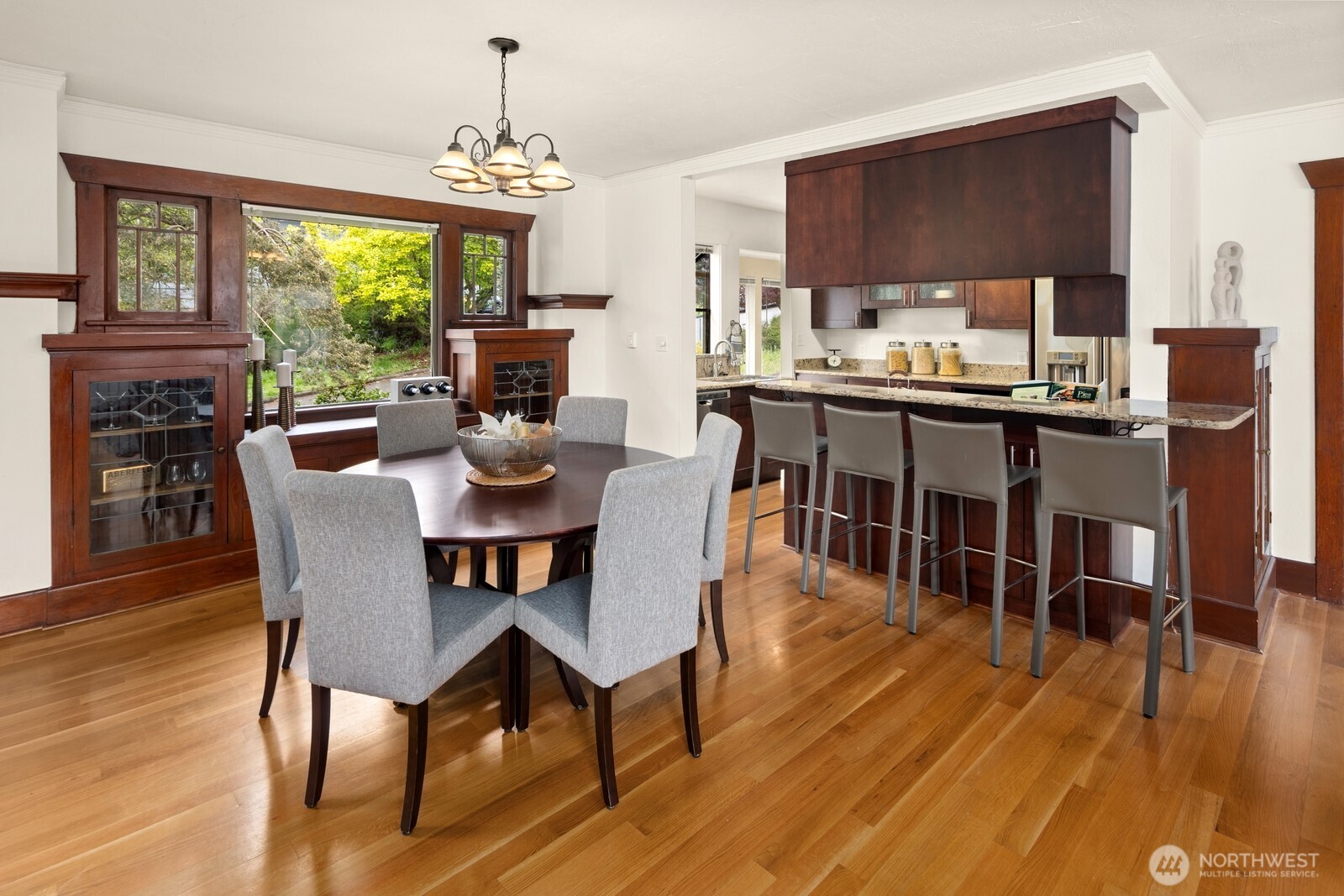4522 3rd Avenue Northwest Seattle, WA 98107 - Photo 4 of 30 a dining room with furniture window wooden floor