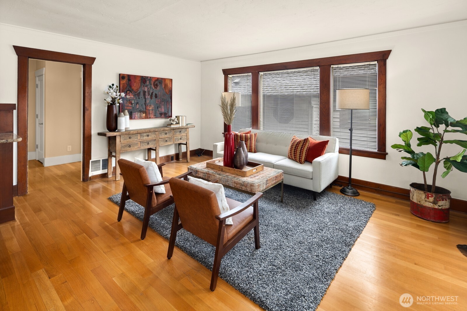 4522 3rd Avenue Northwest Seattle, WA 98107 - Photo 9 of 30 a living room with furniture and a wooden floor