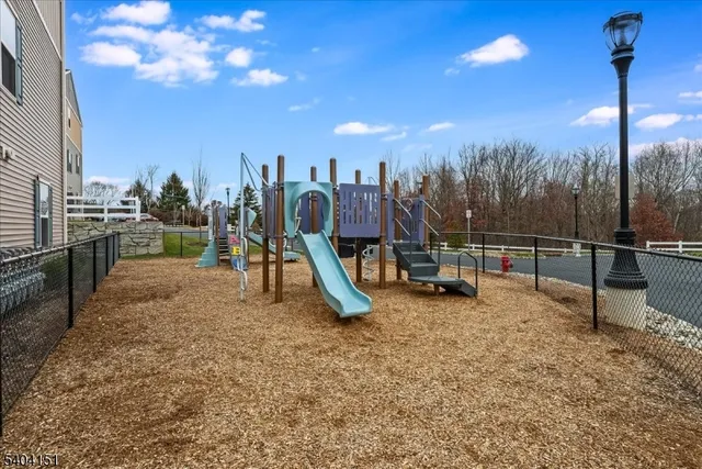 a view of a park with swings