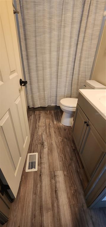 19865 Southwest 5th Place Dunnellon, FL 34431 - Photo 69 of 78 a view of a room with wooden floor and white walls