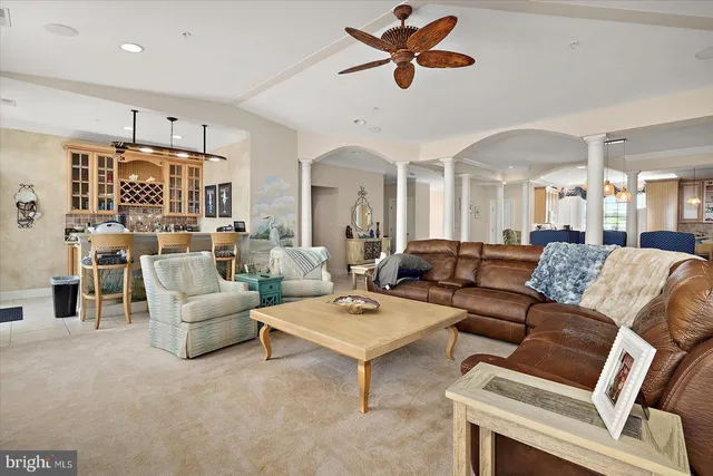 a view of a dining room with furniture and a livingroom
