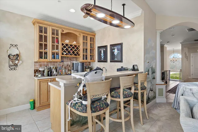 a kitchen with granite countertop a sink and cabinets