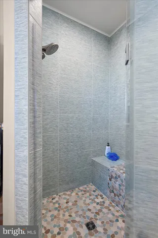 an aerial view of residential building with outdoor space and lake view