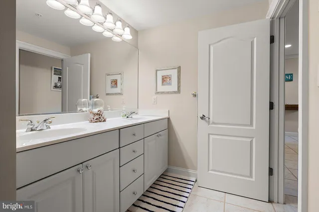 an aerial view of residential building and lake