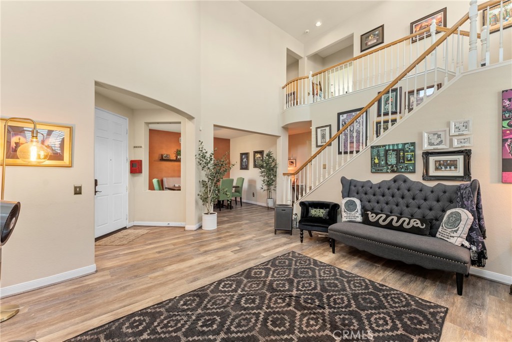 8553 Lodgepole Lane Riverside, CA 92508 - Photo 12 of 75 a living room with furniture and a rug