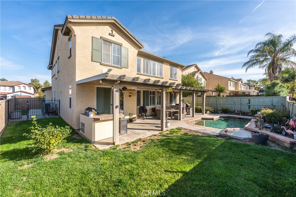 8553 Lodgepole Lane Riverside, CA 92508 - Photo 46 of 75 a view of a house with a yard and sitting area