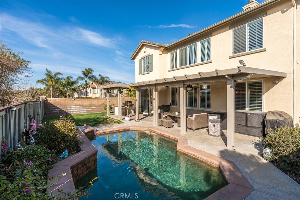 8553 Lodgepole Lane Riverside, CA 92508 - Photo 49 of 75 a view of a house with backyard porch and sitting area
