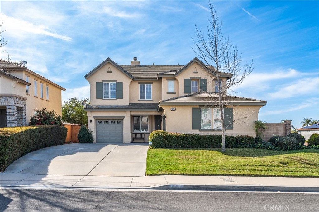 8553 Lodgepole Lane Riverside, CA 92508 - Photo 6 of 75 a front view of a house with a yard