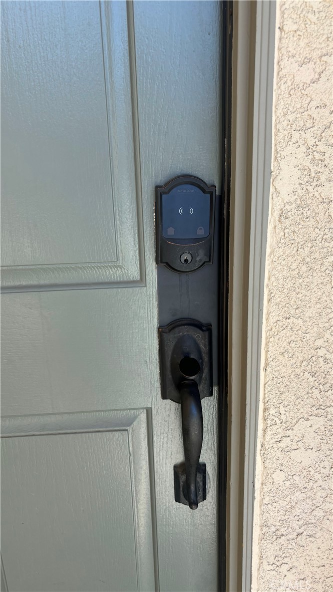 8553 Lodgepole Lane Riverside, CA 92508 - Photo 75 of 75 a close up view of a washer and dryer