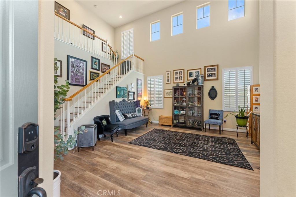 8553 Lodgepole Lane Riverside, CA 92508 - Photo 9 of 75 a living room with furniture and a rug