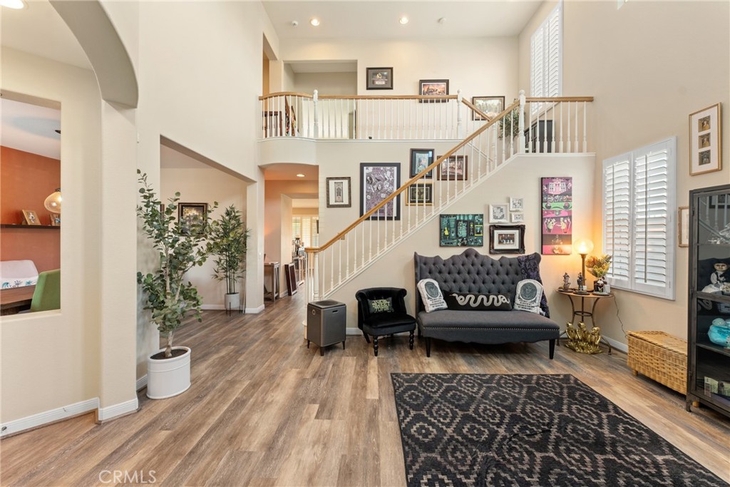 8553 Lodgepole Lane Riverside, CA 92508 - Photo 10 of 75 a living room with furniture and a rug