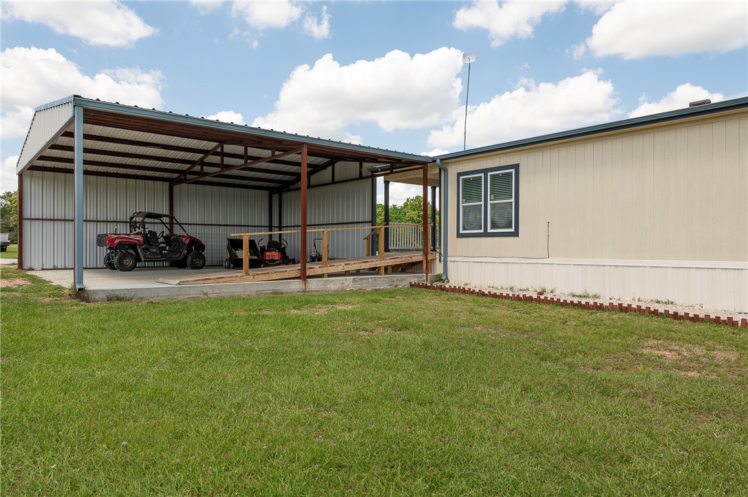 10976 Whiterock Road Bremond, TX 76629 - Photo 25 of 42 a view of a patio with table and chairs and potted plants