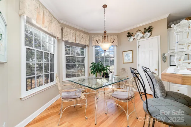 a view of a livingroom with furniture and windows