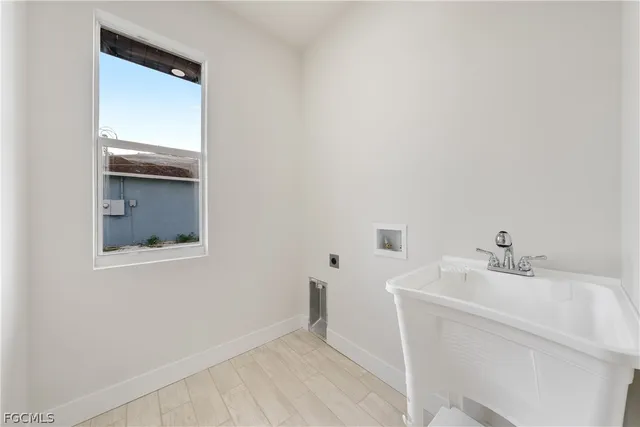 $299,900 | 3300 61st Street West, Lehigh Acres, FL 33971