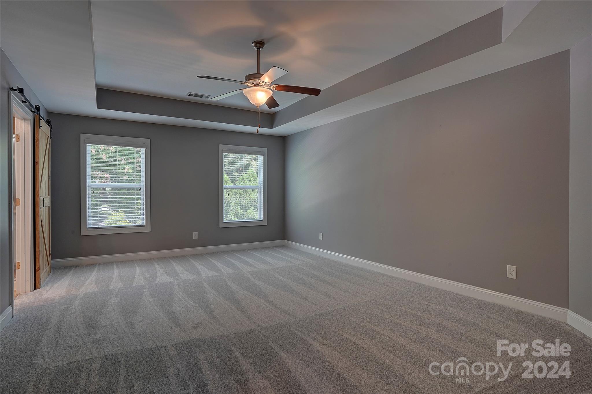 1024 Ridgehaven Road Waxhaw, NC 28173 - Photo 14 of 36 wooden floor in an empty room with a window