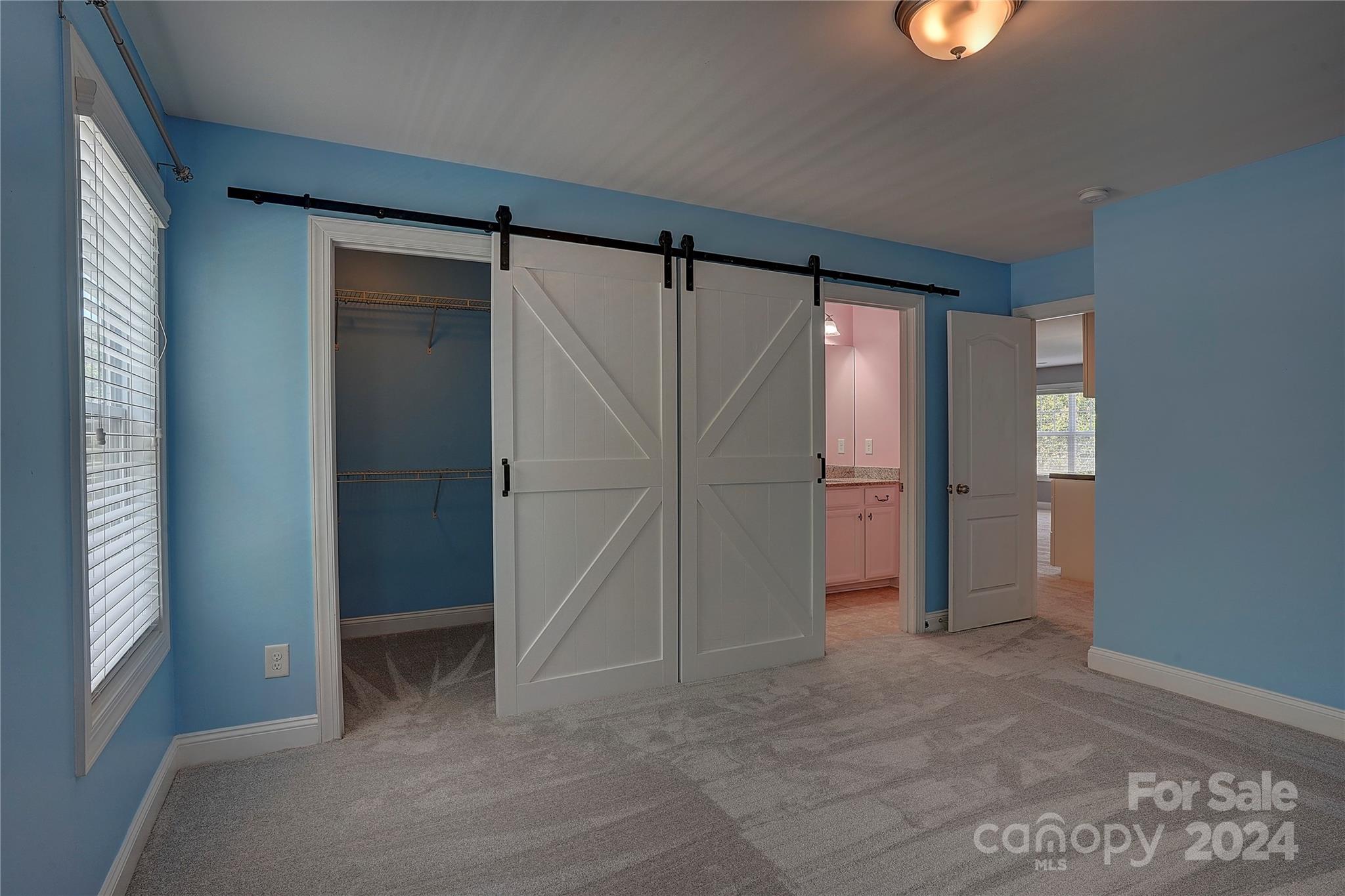 1024 Ridgehaven Road Waxhaw, NC 28173 - Photo 18 of 36 an empty room with an entryway and shower
