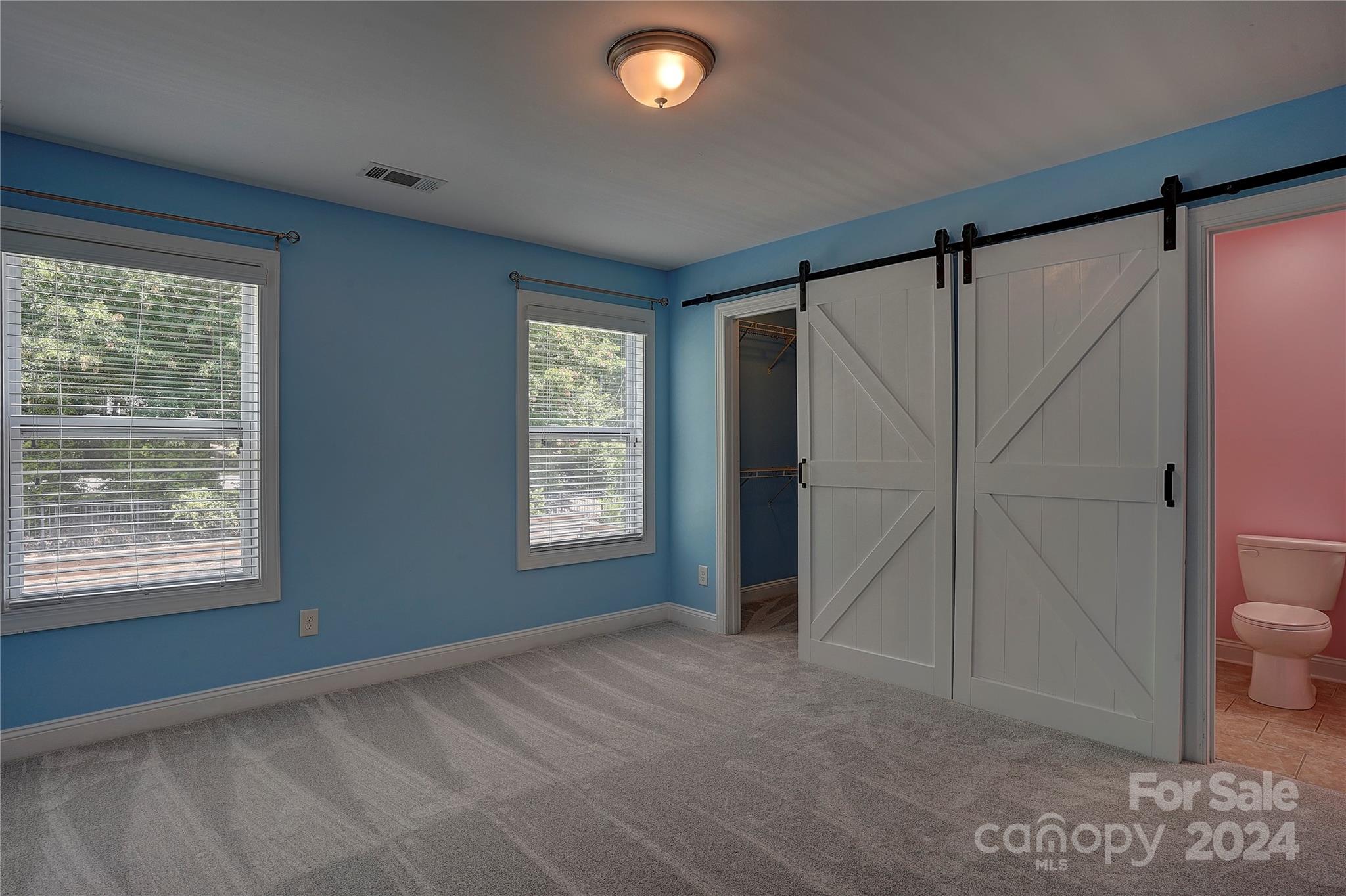 1024 Ridgehaven Road Waxhaw, NC 28173 - Photo 19 of 36 a view of an empty room with a window