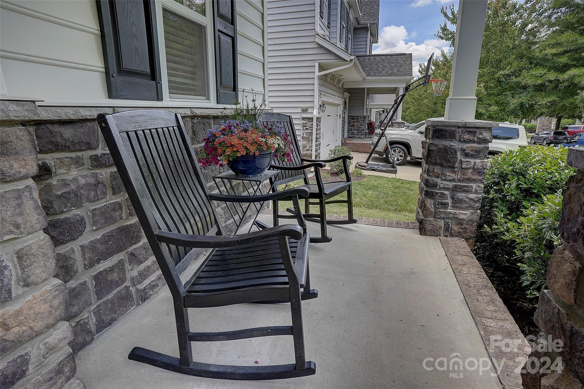 1024 Ridgehaven Road Waxhaw, NC 28173 - Photo 2 of 36 a patio with table and chairs