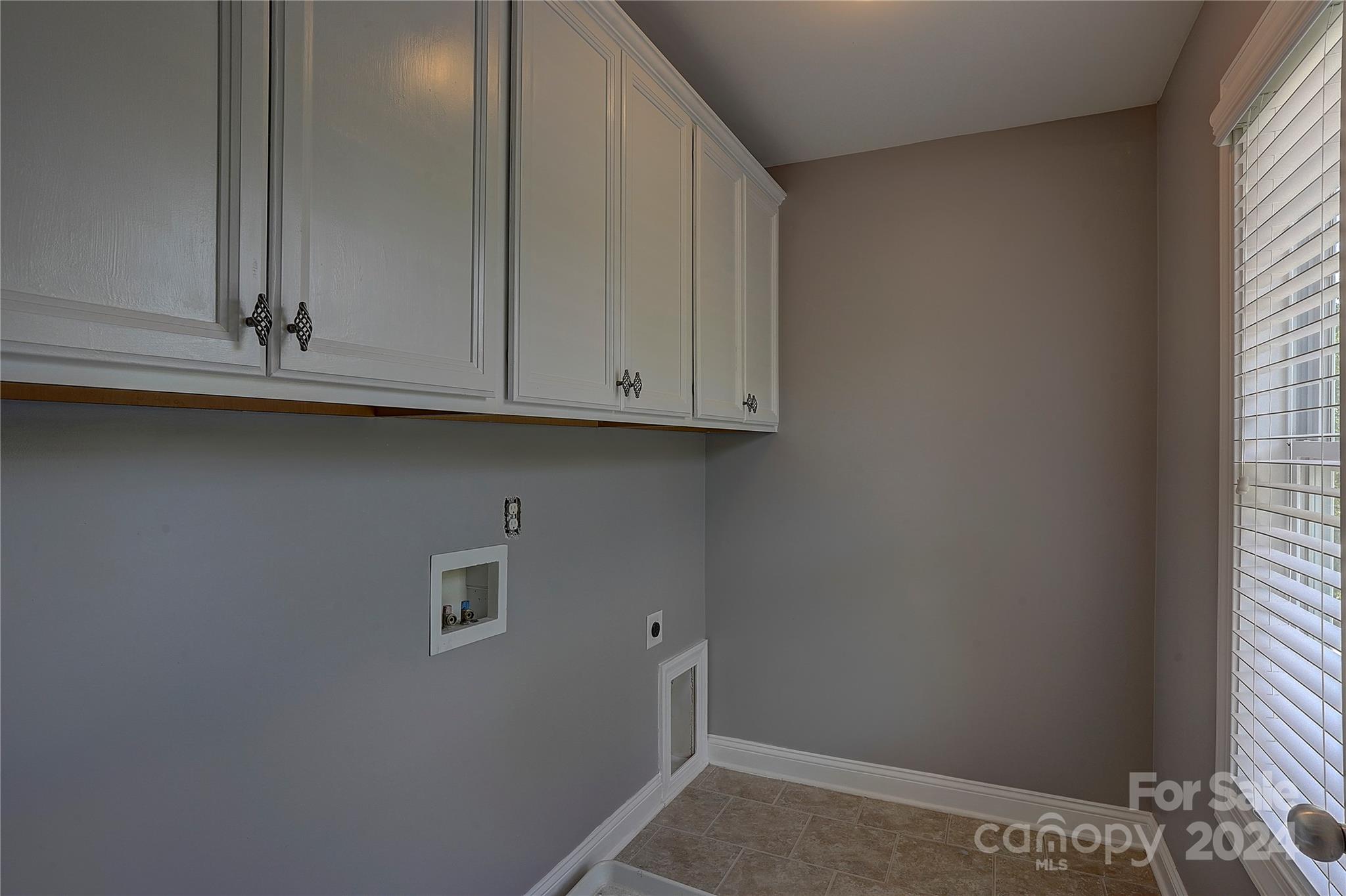 1024 Ridgehaven Road Waxhaw, NC 28173 - Photo 25 of 36 a view of cabinets and window