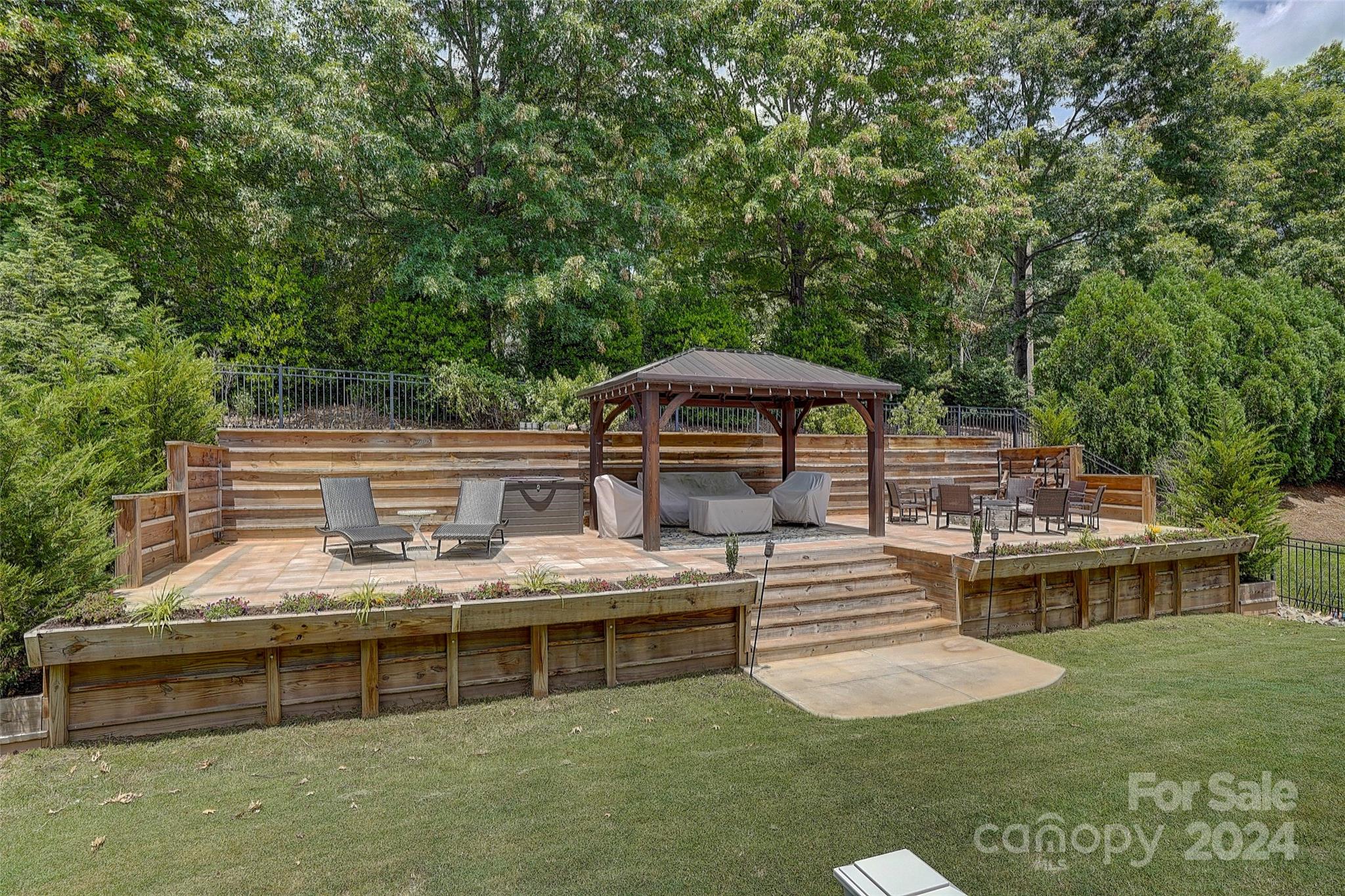 1024 Ridgehaven Road Waxhaw, NC 28173 - Photo 32 of 36 a view of a house with swimming pool and sitting area
