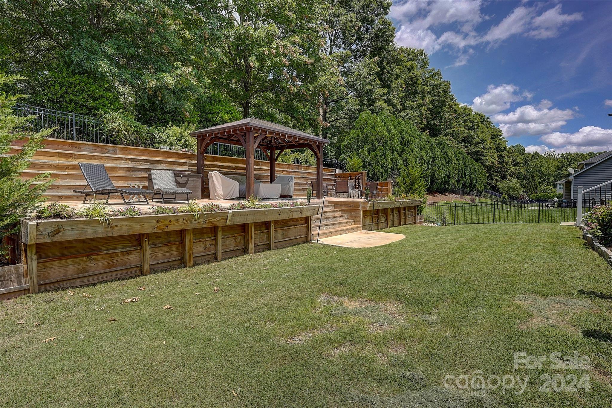 1024 Ridgehaven Road Waxhaw, NC 28173 - Photo 33 of 36 a view of a house with a yard