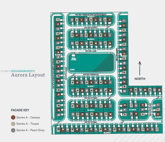 a kitchen with stainless steel appliances kitchen island granite countertop a table chairs and a refrigerator