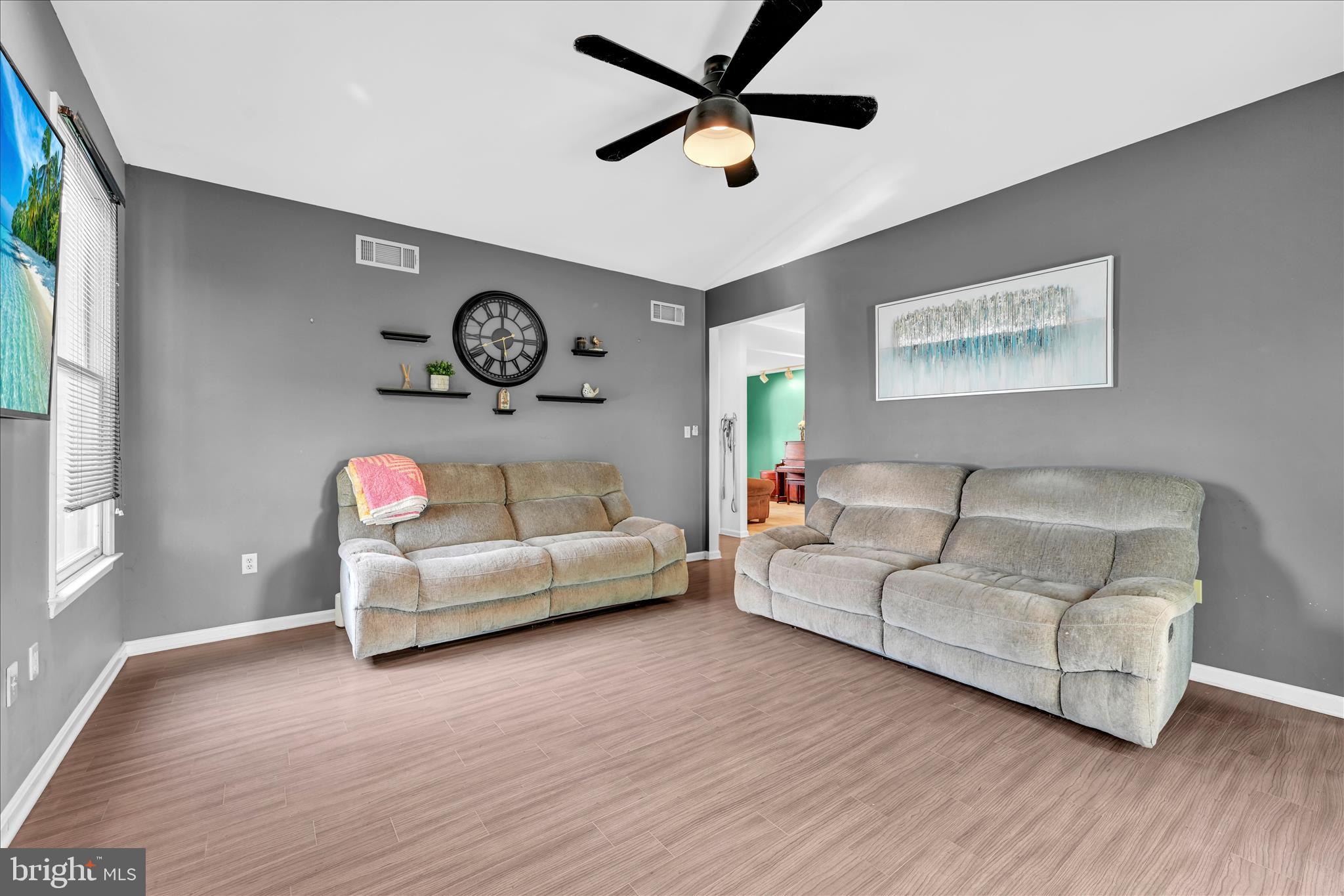 1602 Churchill Road Harrisburg, PA 17111 - Photo 26 of 61 a living room with furniture and a wooden floor