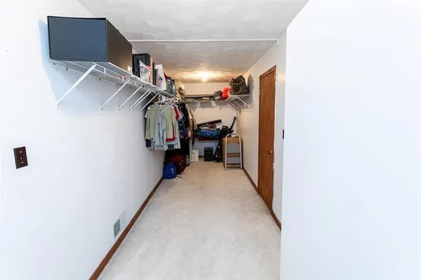 a view of a livingroom with furniture