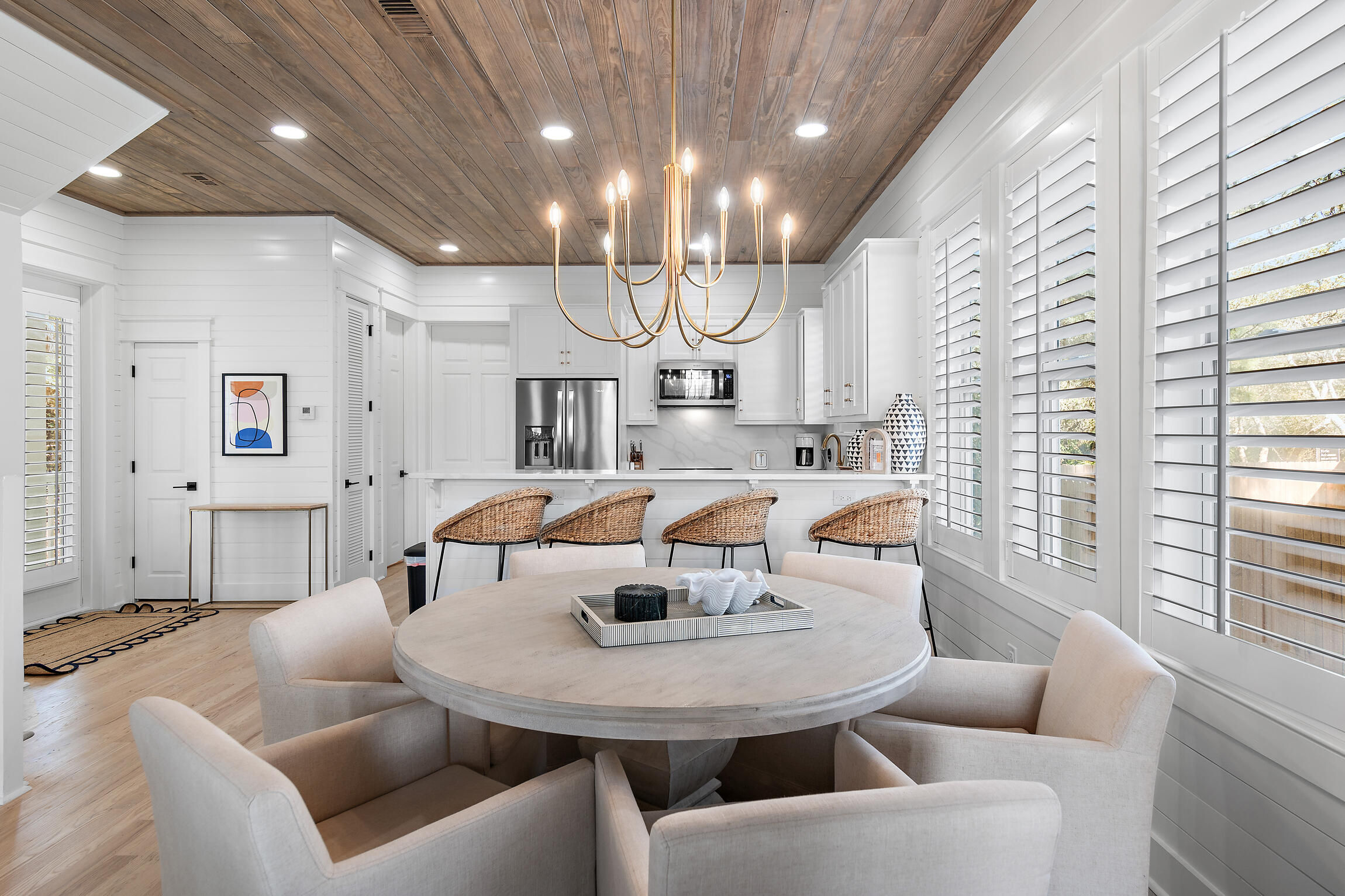 27 Old Mill Road Santa Rosa Beach, FL 32459 - Photo 14 of 43 a view of a dining room with furniture and a large window