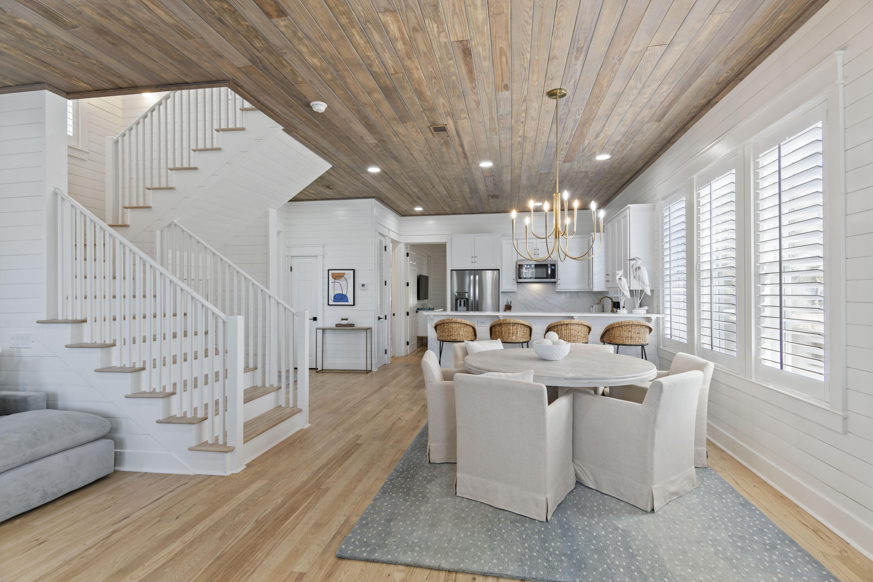 27 Old Mill Road Santa Rosa Beach, FL 32459 - Photo 17 of 43 a large white room with lots of white furniture