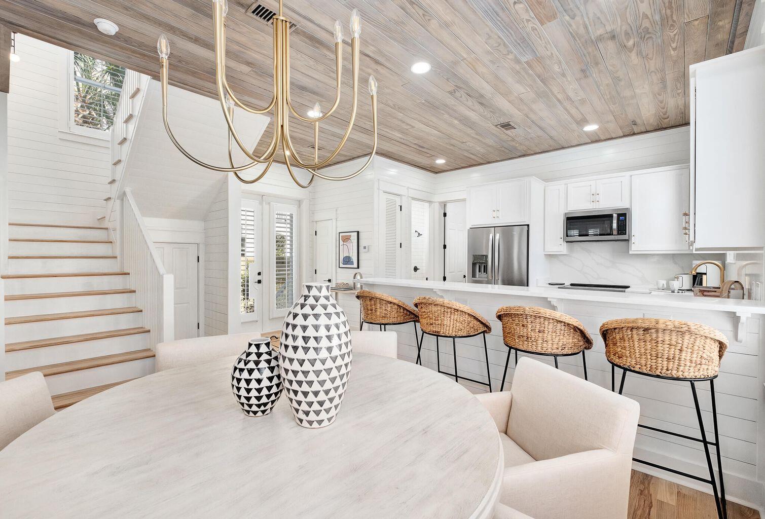 27 Old Mill Road Santa Rosa Beach, FL 32459 - Photo 18 of 43 a living room with furniture a rug and white walls