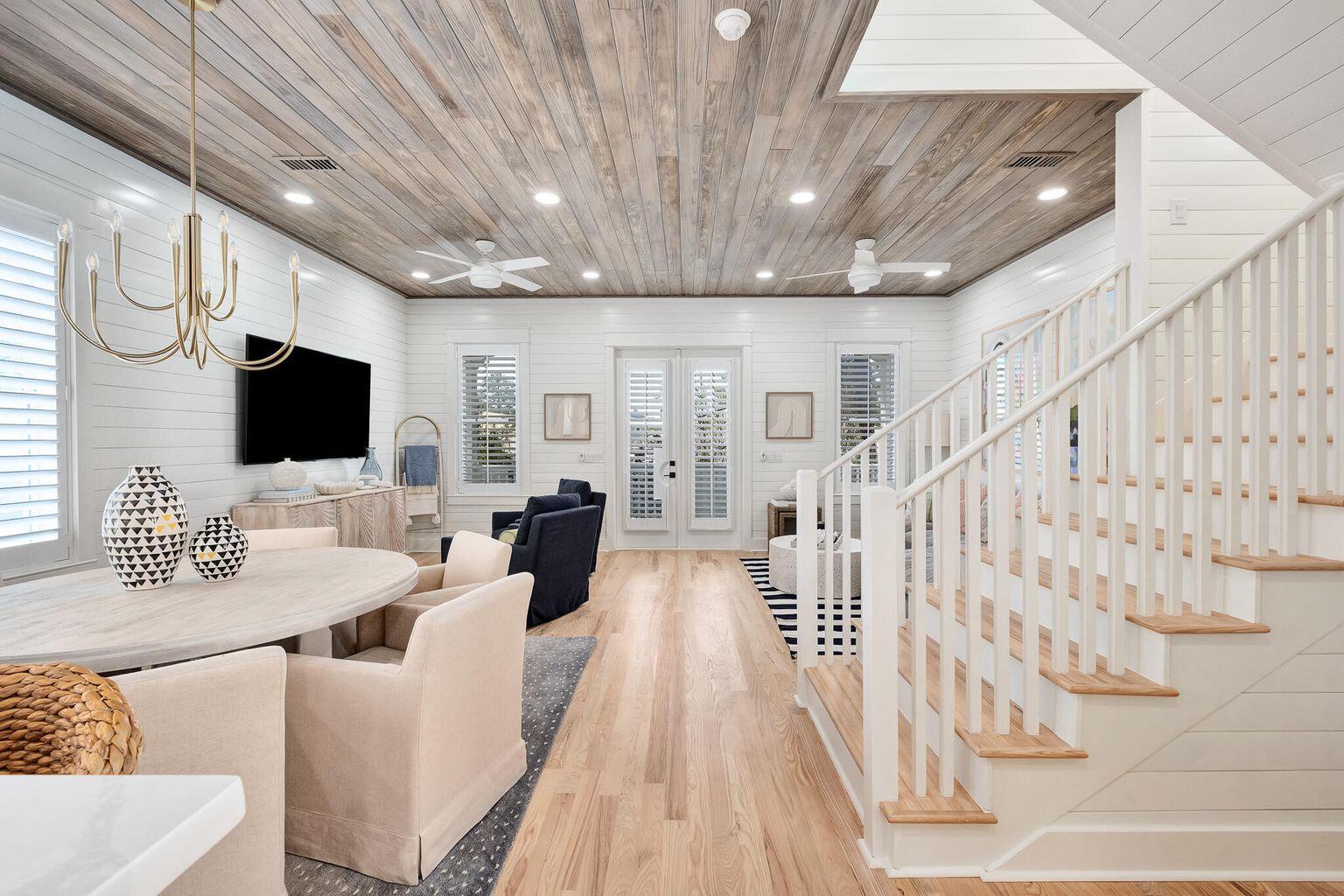 27 Old Mill Road Santa Rosa Beach, FL 32459 - Photo 19 of 43 a living room with furniture and a flat screen tv