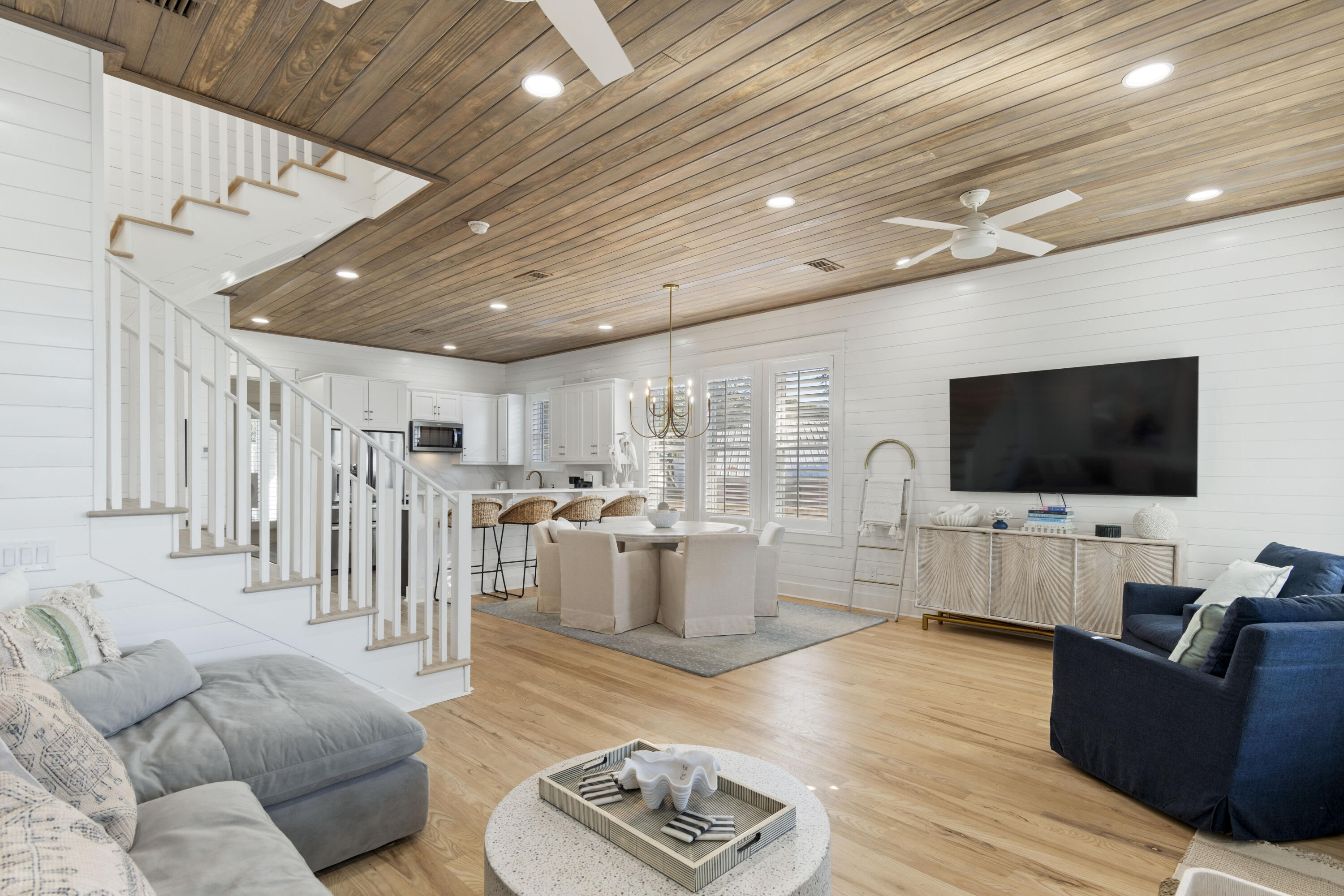 27 Old Mill Road Santa Rosa Beach, FL 32459 - Photo 20 of 43 a living room with furniture and a flat screen tv