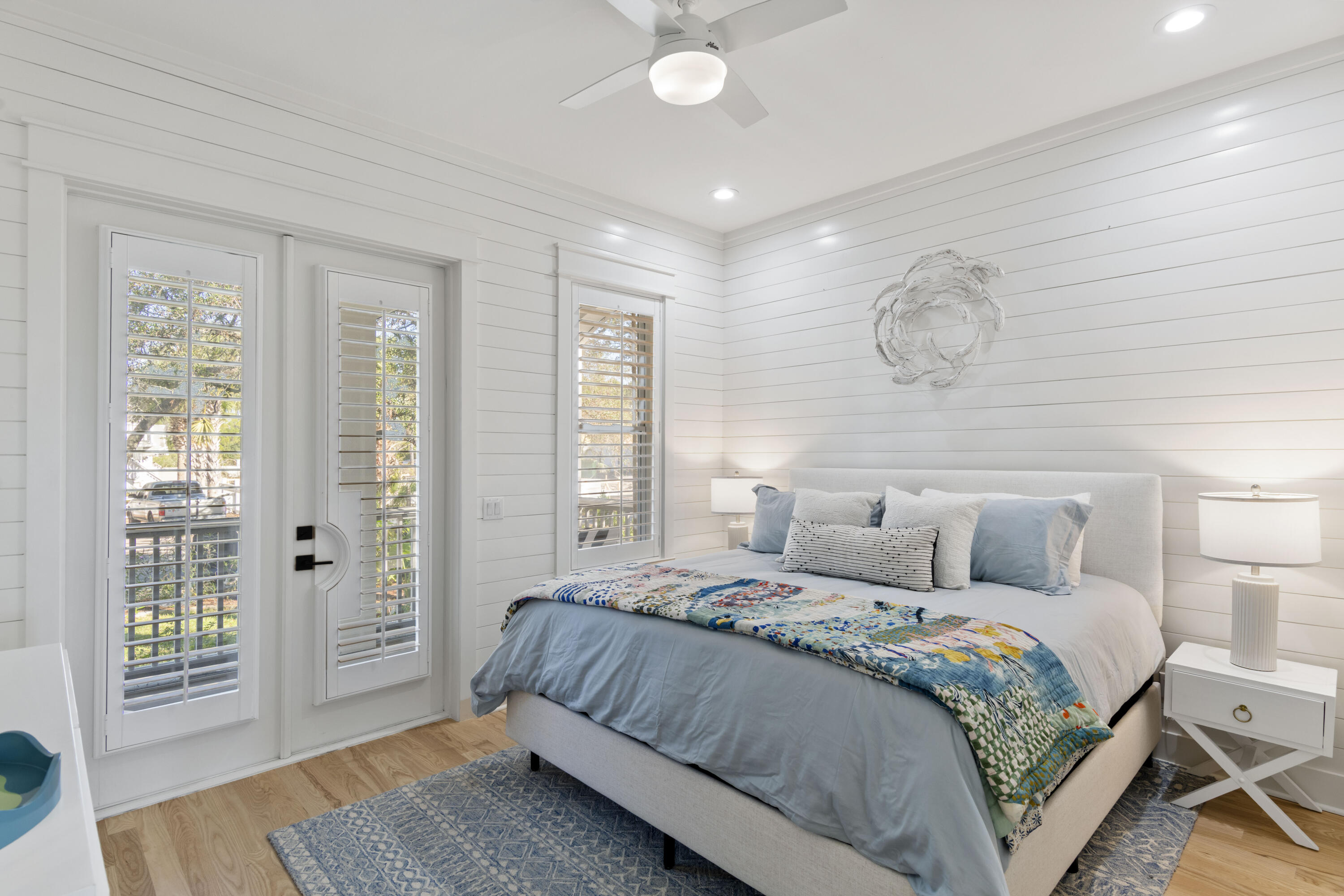 27 Old Mill Road Santa Rosa Beach, FL 32459 - Photo 24 of 43 a bedroom with a large bed and a window