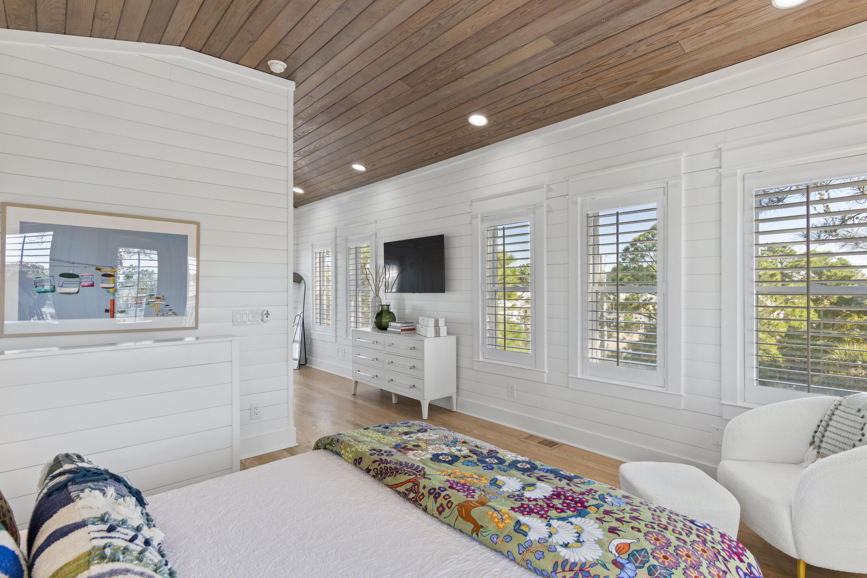 27 Old Mill Road Santa Rosa Beach, FL 32459 - Photo 27 of 43 a bedroom with furniture and flat screen tv