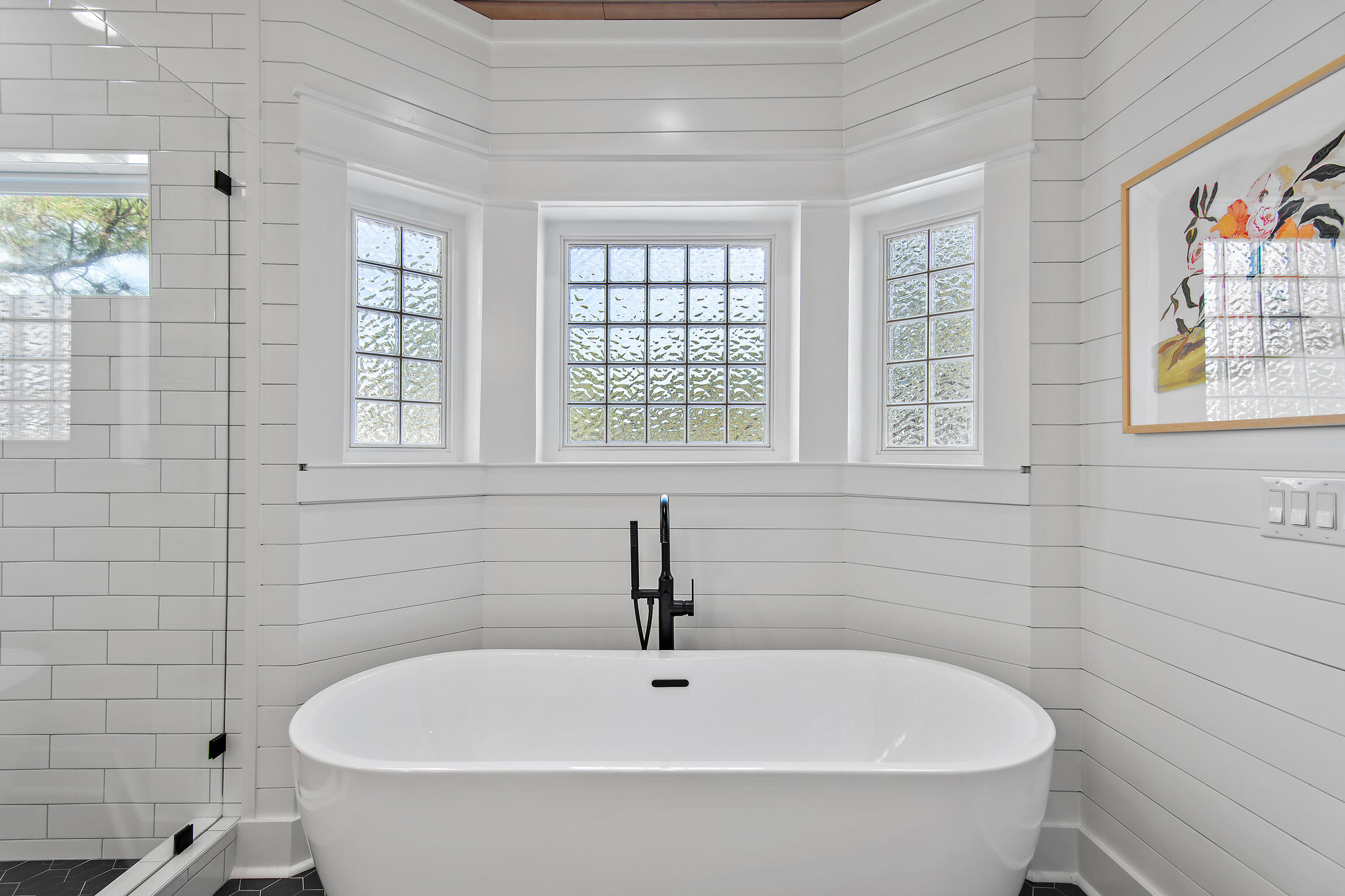 27 Old Mill Road Santa Rosa Beach, FL 32459 - Photo 39 of 43 a white bath tub sitting in a bathroom next to a window