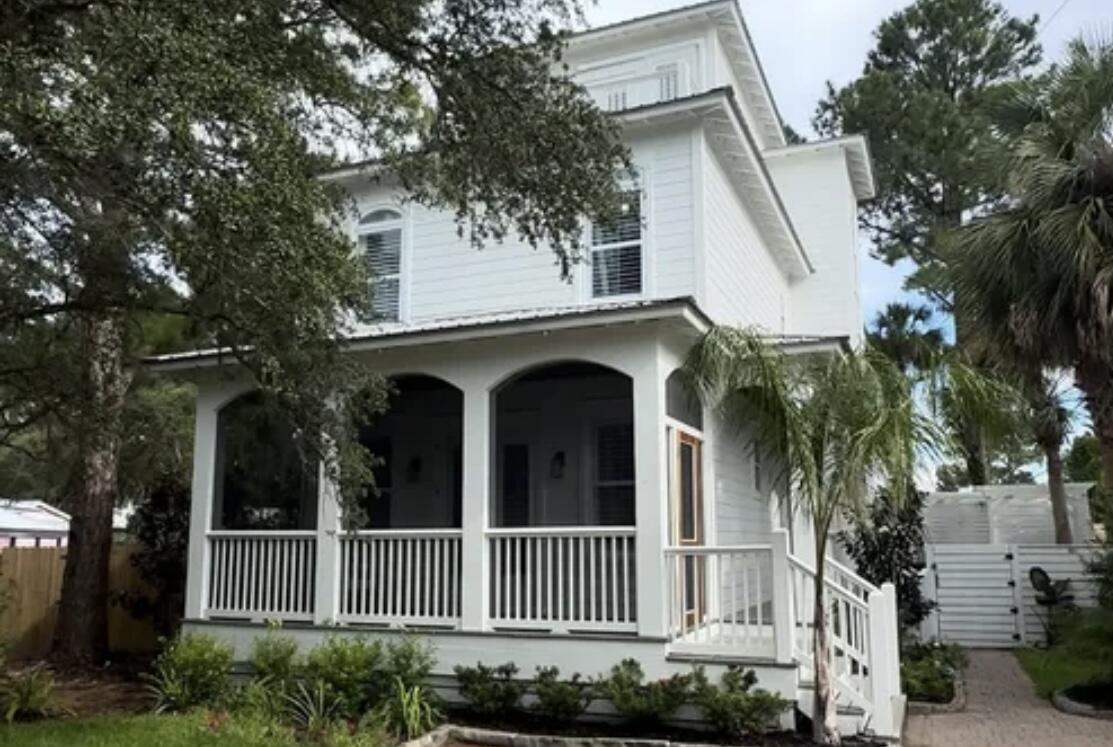 27 Old Mill Road Santa Rosa Beach, FL 32459 - Photo 4 of 43 a front view of a house with plants