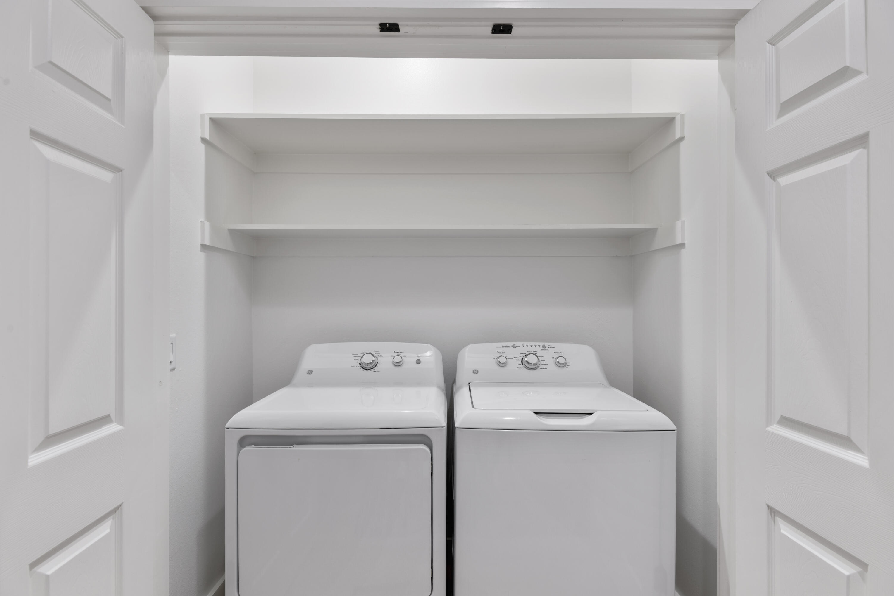 27 Old Mill Road Santa Rosa Beach, FL 32459 - Photo 43 of 43 a utility room with dryer and washer