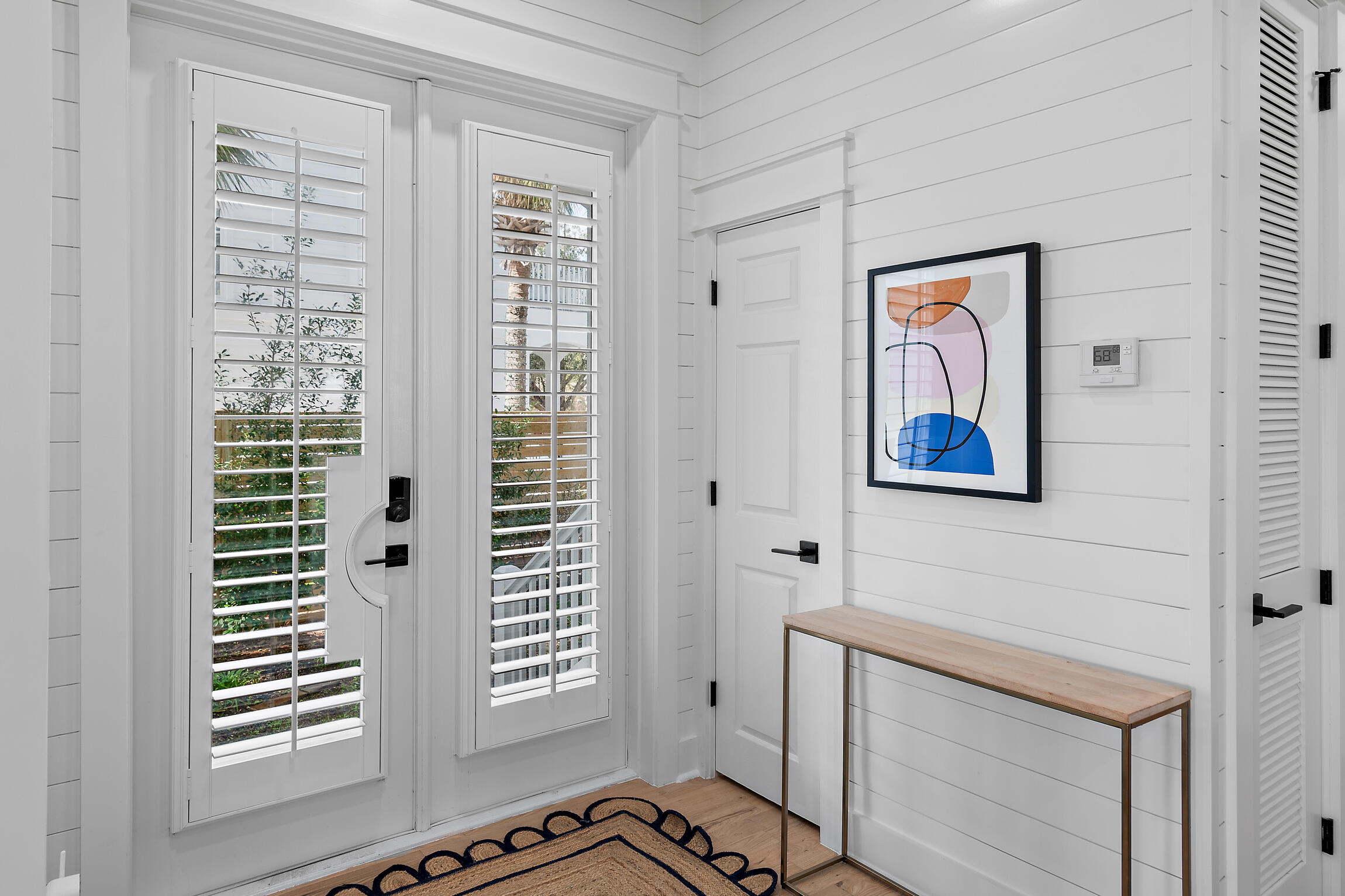 27 Old Mill Road Santa Rosa Beach, FL 32459 - Photo 9 of 43 a view of an empty room with a window and a door
