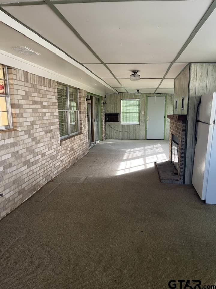 2806 North Glass Avenue Tyler, TX 75702 - Photo 15 of 25 a view of a livingroom with a fireplace