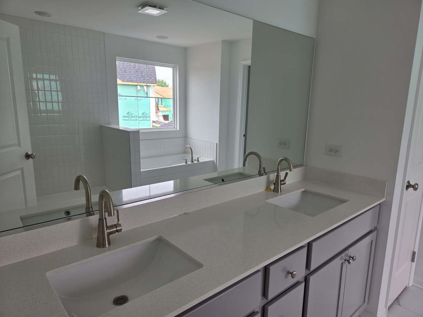 17431 Victoria Lane Lockport, IL 60441 - Photo 11 of 20 a bathroom with a sink and a large mirror