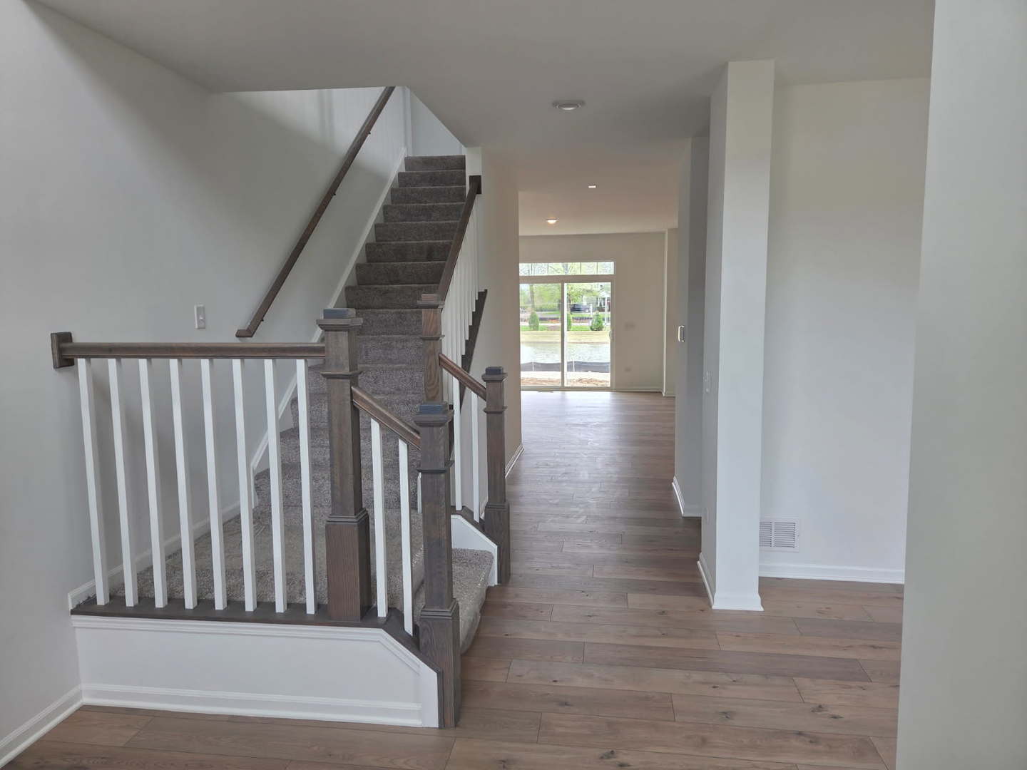 17431 Victoria Lane Lockport, IL 60441 - Photo 2 of 20 a view of entryway with wooden floor