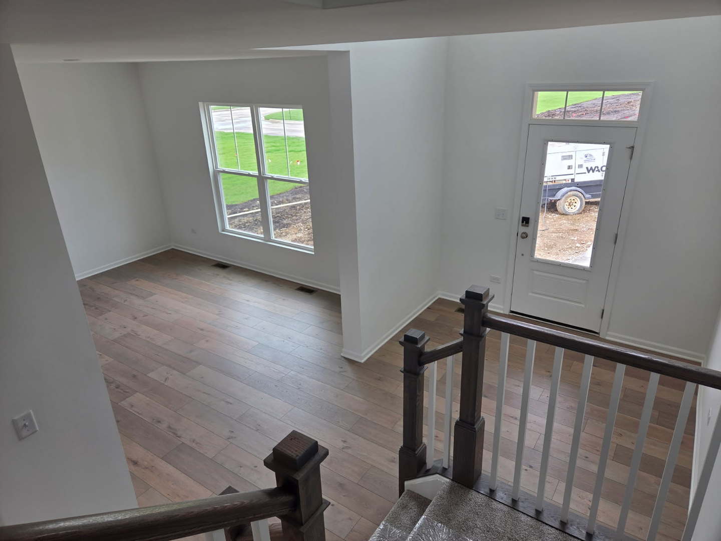 17431 Victoria Lane Lockport, IL 60441 - Photo 3 of 20 a view of an empty room with a window